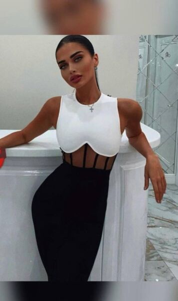 Kadın Bisiklet Yaka Kolsuz çift Renk Ve Bel Transparan Korse Detay Midi Boy Elbise